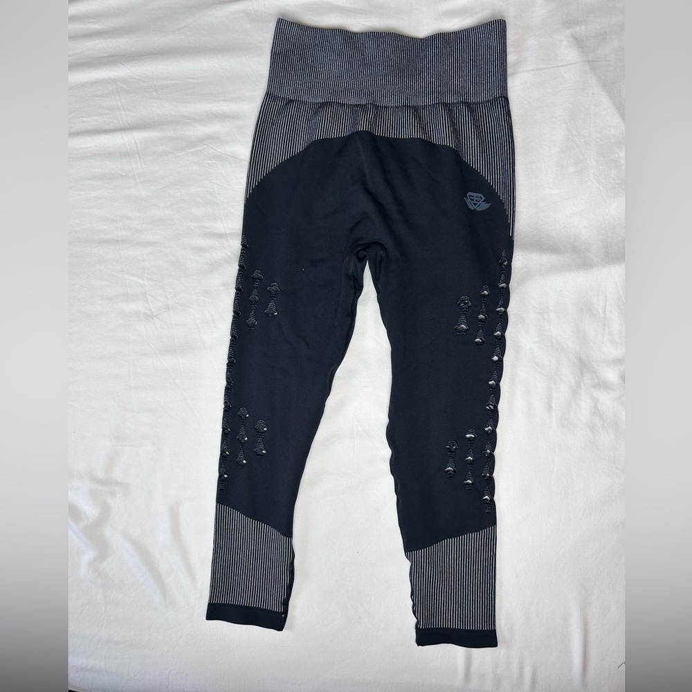 Never worn body engineer black ripped seamless leggings with stripe detail